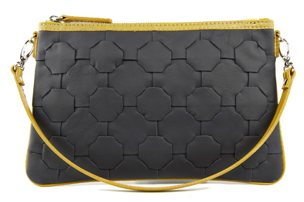 Elvis & Kresse Fire & Hide Clutch Bag in blue with yellow hose at Supernomad