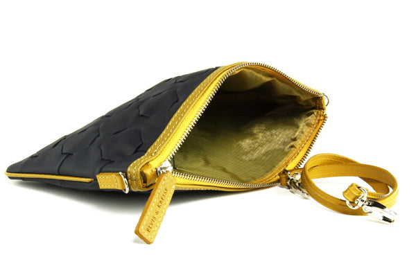 Elvis & Kresse Fire & Hide Clutch Bag in blue with yellow hose at Supernomad